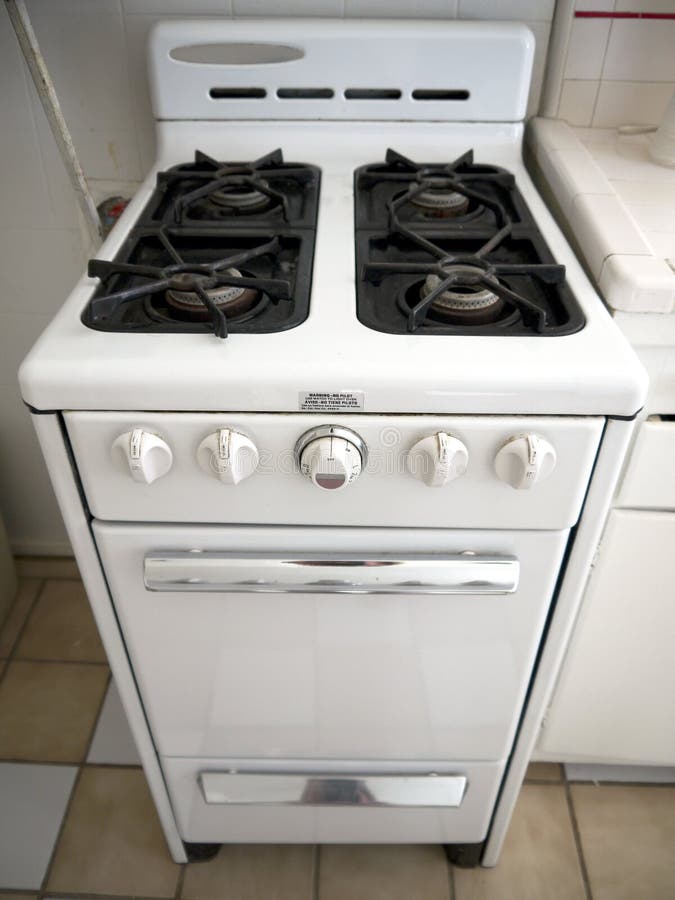 1950s kitchen: retro gas stove. Retro white stove in 1950s kitchen royalty free stock photography