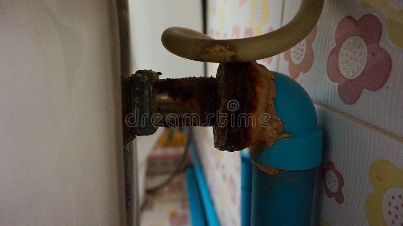 Aluminum water pipe was rusty in bathroom. Aluminum water pipe was rusty and dirty in bathroom royalty free stock images