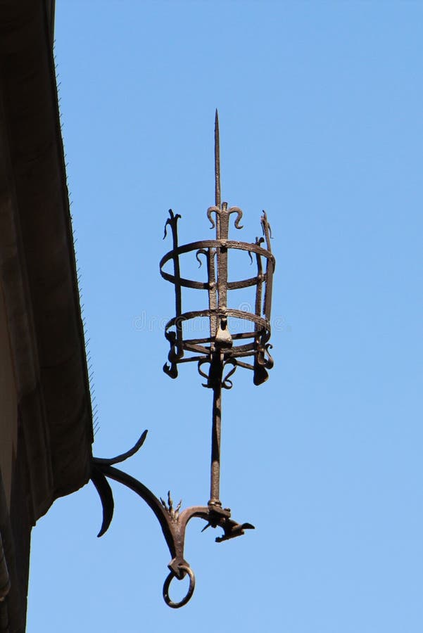 Architectural decoration with imitation of a lantern in the city of Lucca, Italy. The picture was taken on August 6, 2015 royalty free stock images