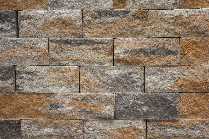 Artificial decorative stone on the building stock photos