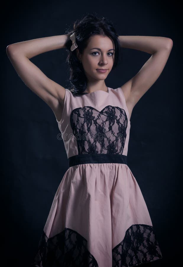 Attractive young woman with arms stock image