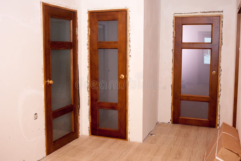 Beautiful installed wooden doors in the house. Door royalty free stock images