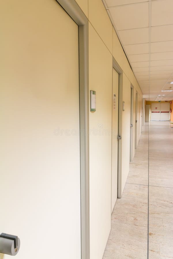 Beige hospital hallway; empty hospital corridor; hospital interi. Or healthcare series royalty free stock photography