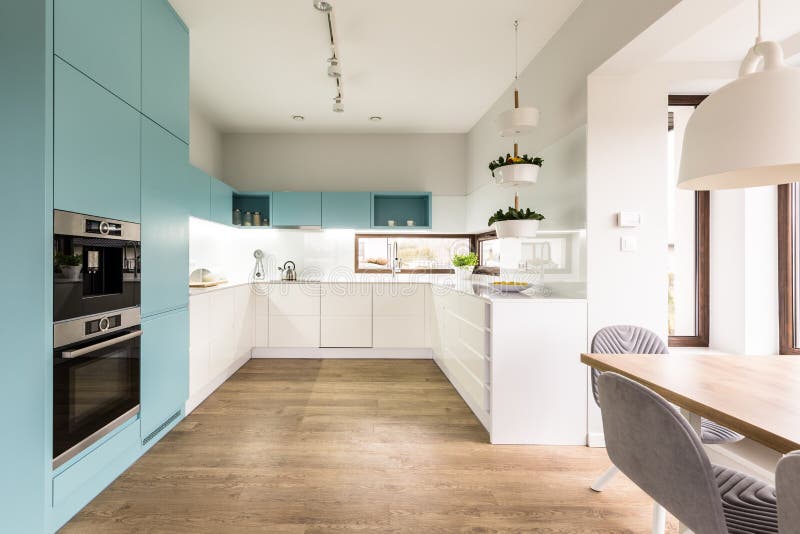 Blue and white kitchen interior royalty free stock photography