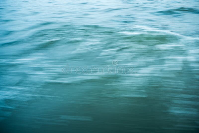 The blurring of the flowing stock photo