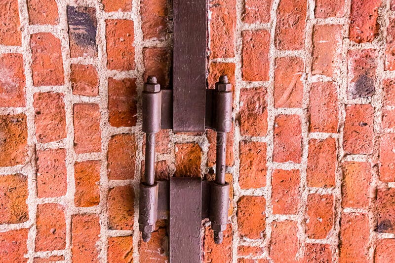 brick wall with iron plate rusty weather-beaten coupler loft design base urban style background royalty free stock photos