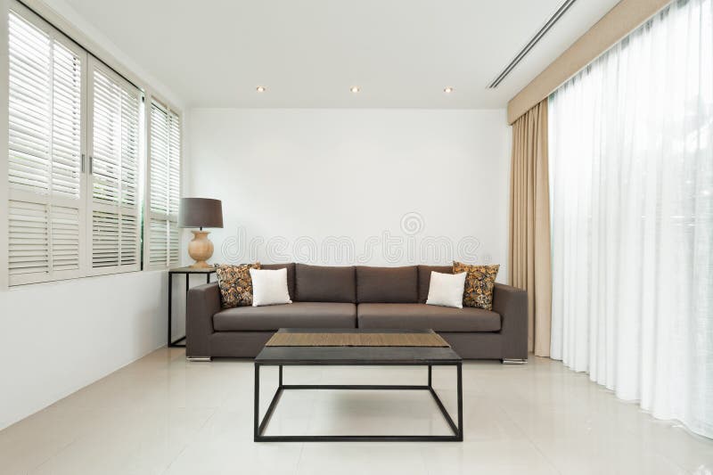 Bright Living room with grey sofa stock photo