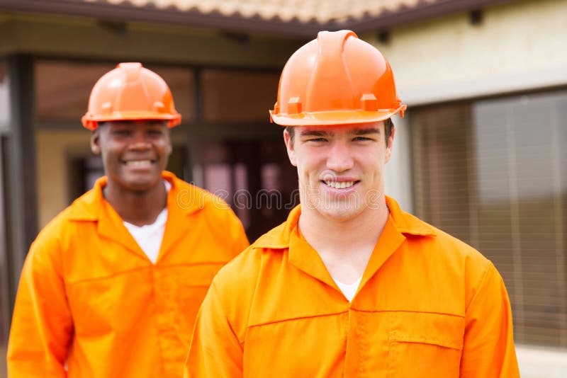 Builder and co-worker stock photo