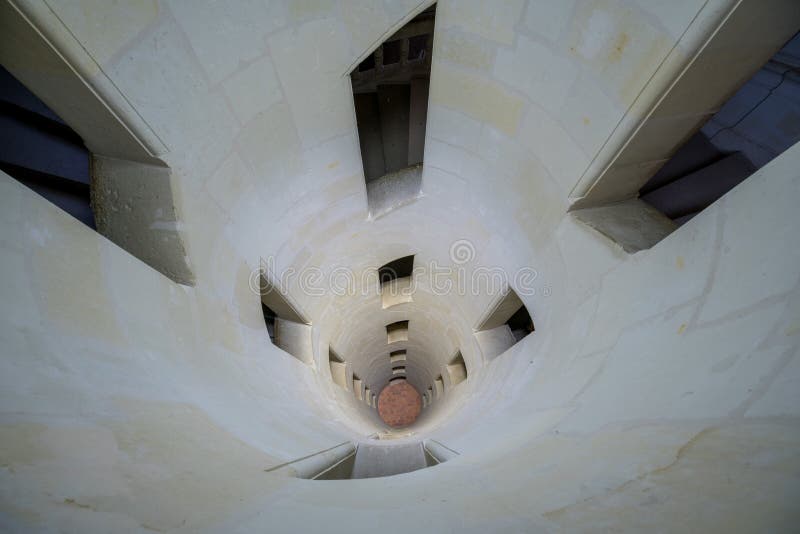 Building architecture details in Chambord Castle, structure of stone spiral stairs inside the castle.  royalty free stock images