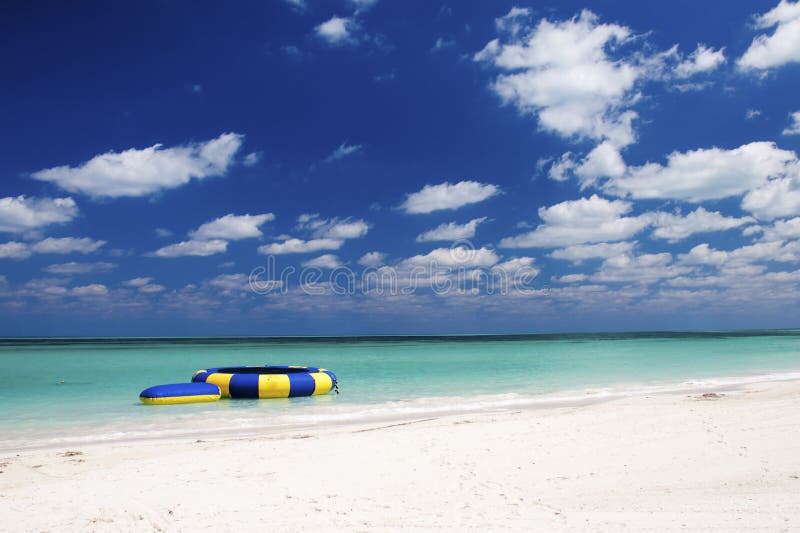 Caribbean Water Trampoline and Beach stock photography