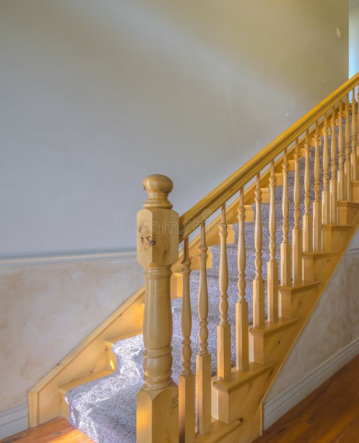 Carpet stairs with wood railing in home. In Nephi, Utah stock images