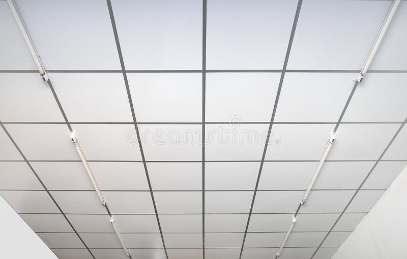 Ceilings indoor white square. Ceilings white square with bulbs royalty free stock photo