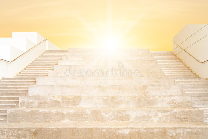 The cement stairs are designed by a large staircase are between normal stairs. The cement stairs are designed by a large staircase in the middle and the stairs royalty free stock photo