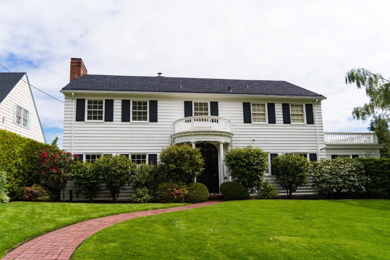 Classic American clapboard suburban house. Clapboard suburban house in classic American-style stock photo