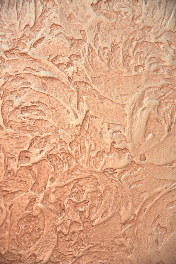 Texture of decorative plaster close-up. Close-up texture of decorative plaster. Art soft focus and toned royalty free stock photo