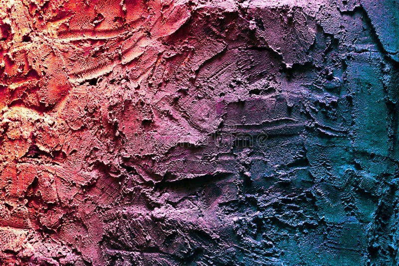 Close up texture of multicolor embossed plaster on the wall. Rough surface of the wall stock image