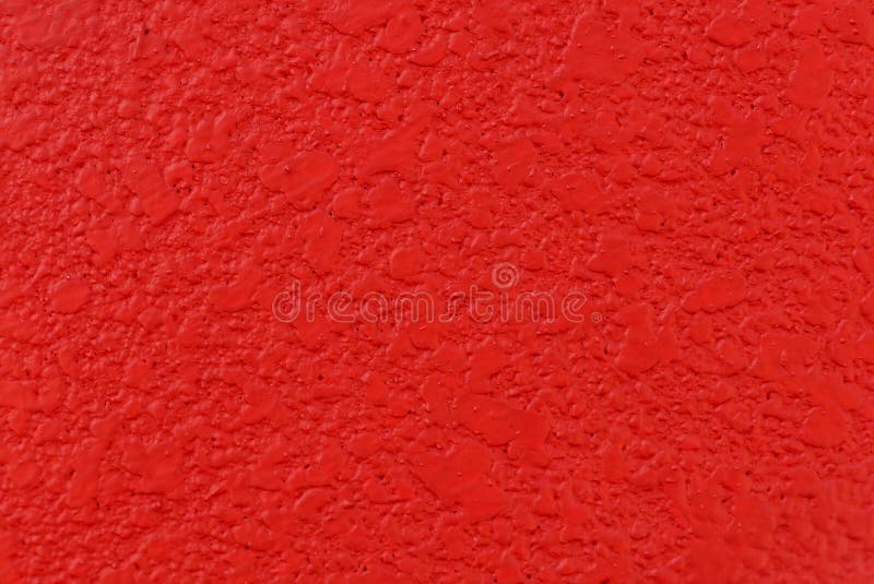 Close up view of red wall texture for background stock image