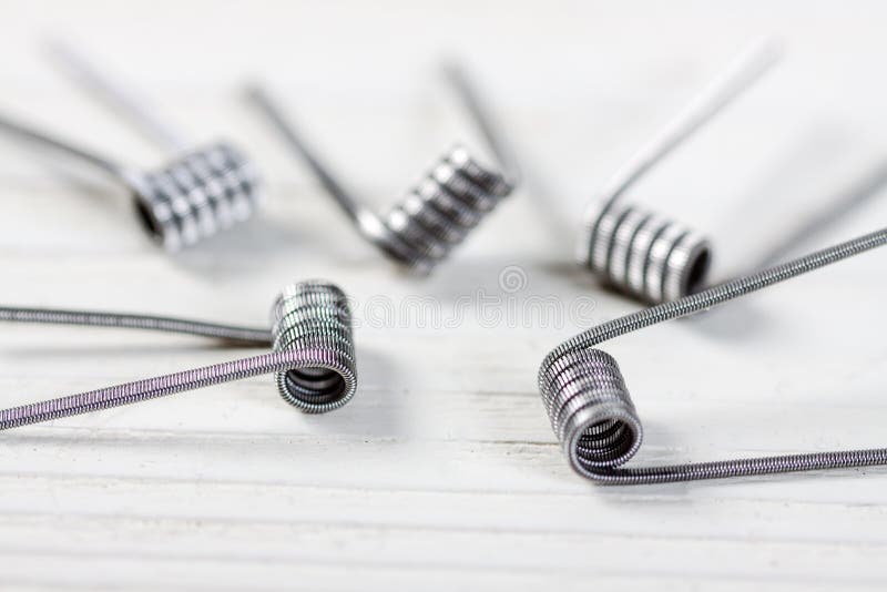 Coils for vape. Or e-cig dripping atomizers, accessories for vaping, macro shot stock images