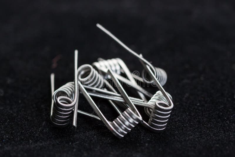 Coils for vape. Or e-cig dripping atomizers, accessories for vaping, macro shot stock photo
