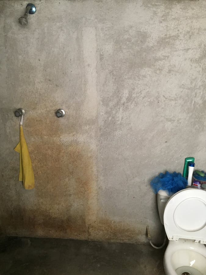 Combined shower and toilet. Inner view of an outhouse at a ranch in rural Mexico stock photography