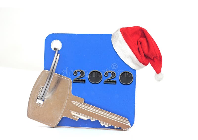 Concept for business, new year, real estate, property, rental, hotel business, building. 2020 happy new year wood number and keys. On white royalty free stock photo