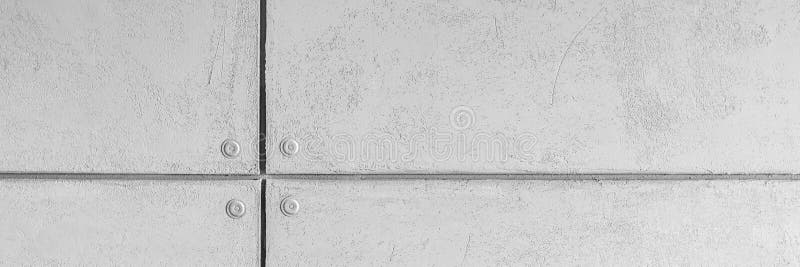 Concrete effect tiles. Panoramic view of grey concrete effect wall tiles royalty free stock photography