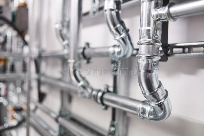 Plumbing service. copper pipeline of a heating system in boiler room stock photos