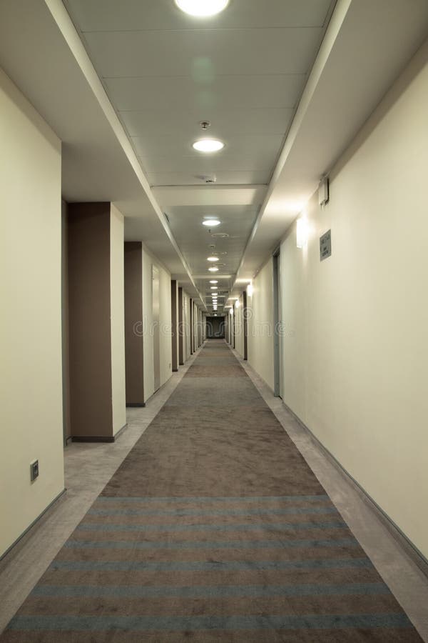 Corridor. Very long corridor in a hotel stock photo