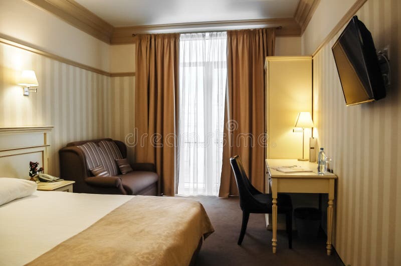 Cozy modern interior design of hotel room. A cozy modern interior design of hotel room stock photo