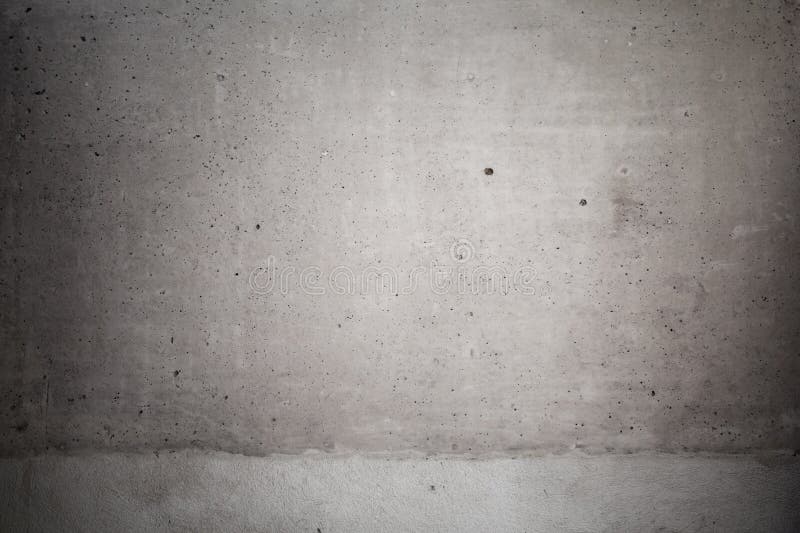 Dark gray concrete wall with vignette effect. Background photo texture royalty free stock images