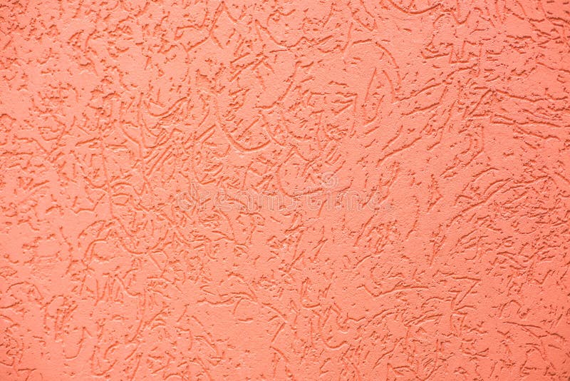 Decorative plaster `bark beetle` orange or terracotta color. Texture royalty free stock photo