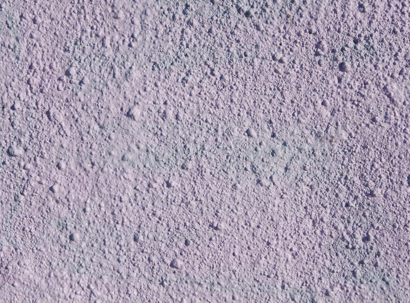 Decorative relief light purple plaster on wall. Closeup stock photos
