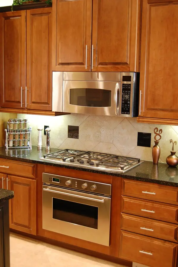 Desiger Kitchen. Designer Kitchen with oven microwave and stove stock photos