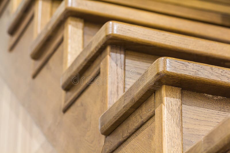 Detail close-up image of wooden oak stairs in house interior royalty free stock images