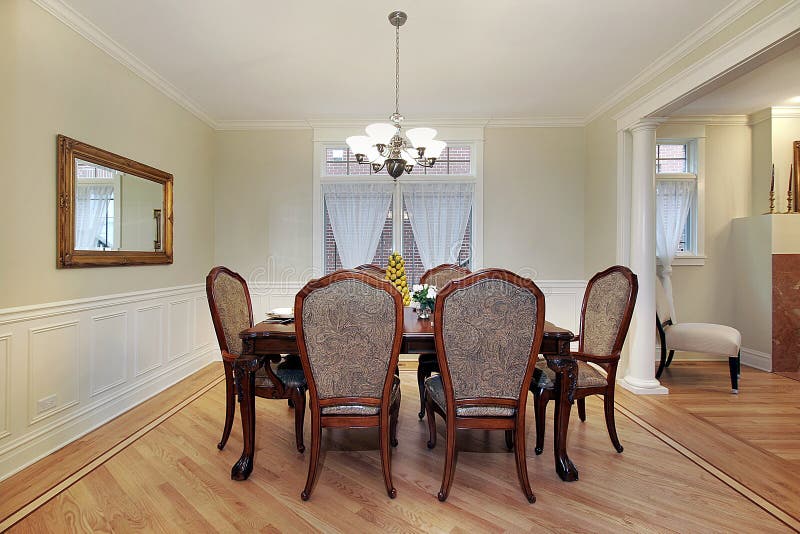 Dining room in luxury home stock photography