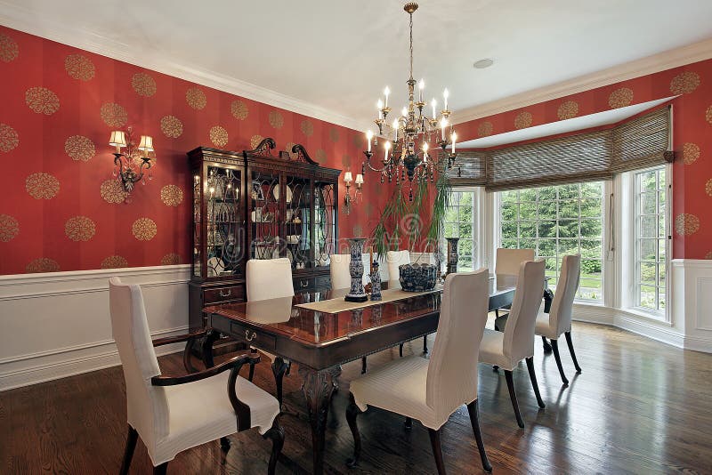 Dining room with red walls royalty free stock photography