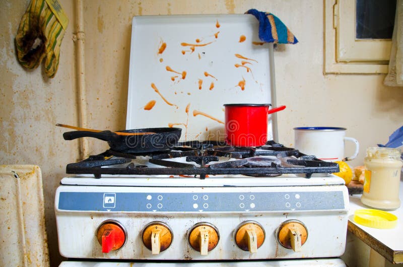 Dirty kitchen stove. Incredible dirty gas cooker stove royalty free stock photos