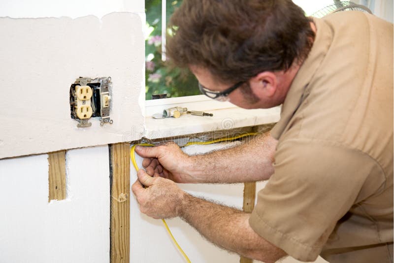 Electrician Wiring Home royalty free stock photography