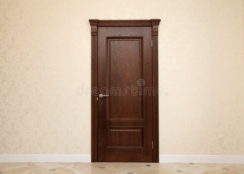Beige room interior with brown wooden door. Empty beige room interior with brown wooden door and copy space royalty free stock image