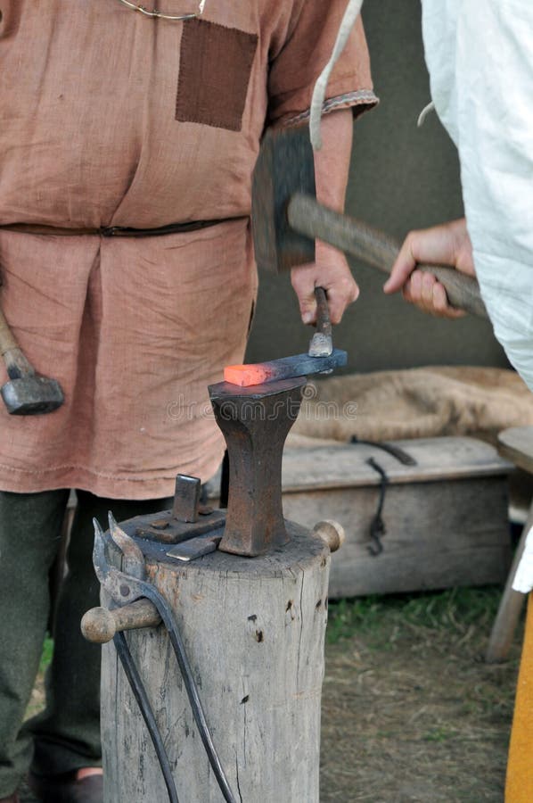 Forging. On a middle ages market royalty free stock photo