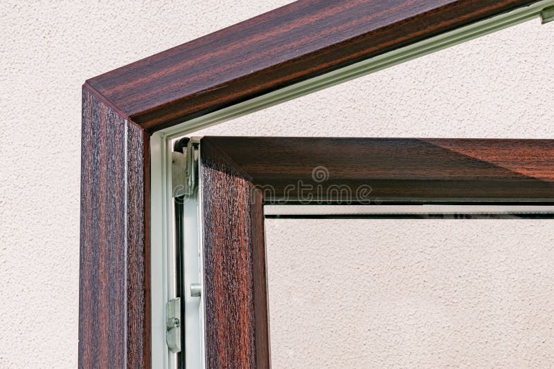 Fragment of a new plastic window. With lamination and open sash stock photos
