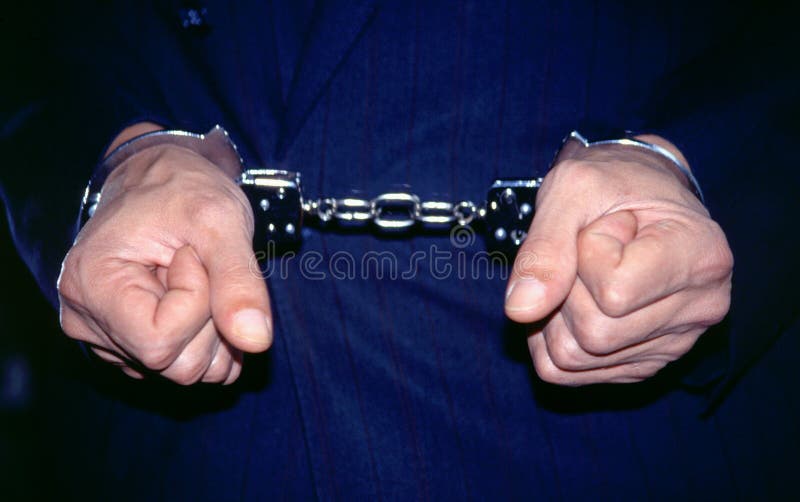 Gangster In Handcuffs royalty free stock photo