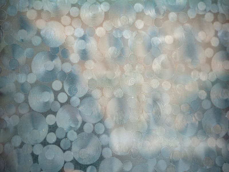 Glass surface with decorative elements on surface. Background for design. Frost imitation on window. Interior decoration. Bumpy. Embossed backdrop texture with royalty free stock image