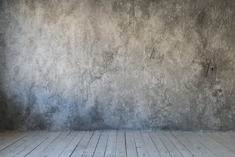 Gray textured wall of concrete and wood floor. Free space for text.  stock photos