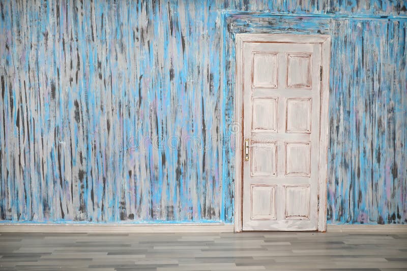 An old door on a mottled wall royalty free stock image