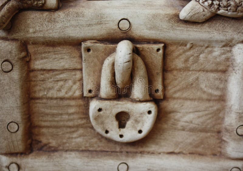 gypsum padlock in the closed wall of the chest piggy banks royalty free stock photography