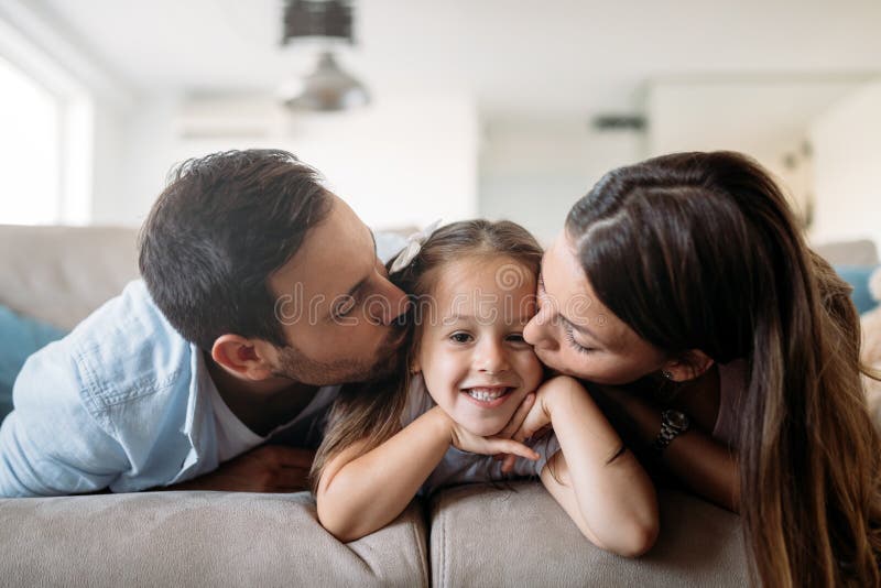 Happy family having fun time at home stock photo