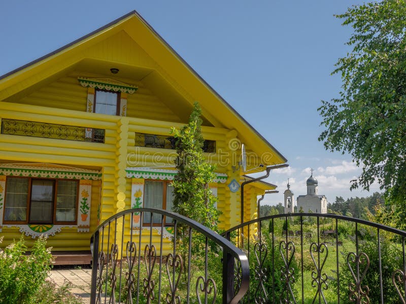 A house in the old Russian style in the Yukhnovgrad district of the Kaluga region of Central Russia. Yukhnovgrad is surrounded by the Ugra national Park in the stock photo