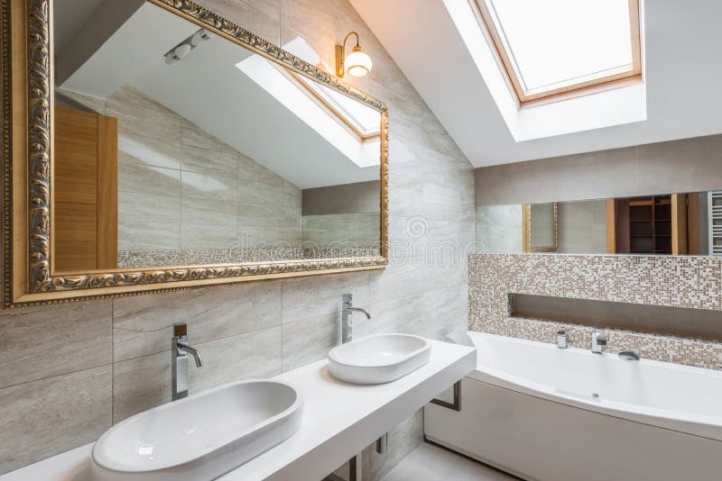 Interior of a luxury bathroom in loft apartment. Interior of a new luxury bathroom in loft apartment stock photo