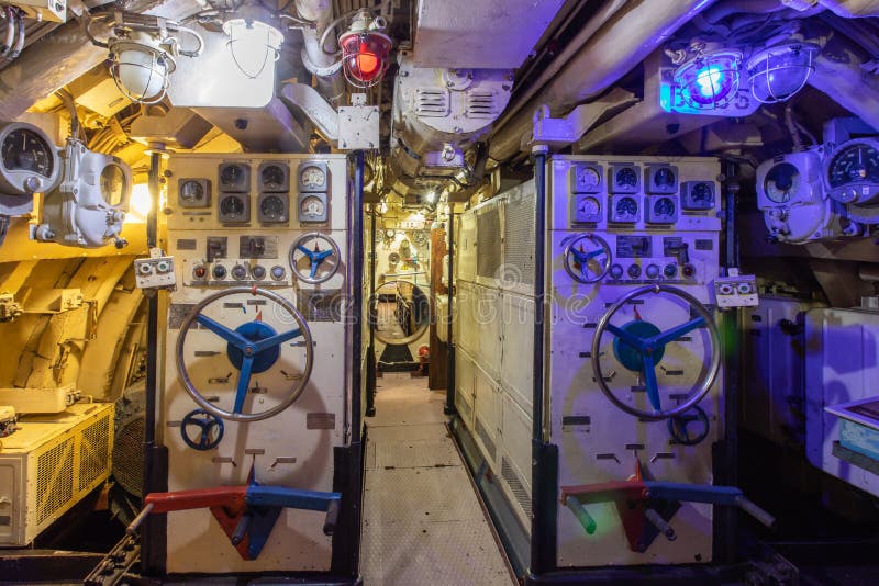Interior of old abandoned Russian Soviet submarine. Interior of combat submarine compartment with devices of control. Interior of old abandoned Russian Soviet stock photos